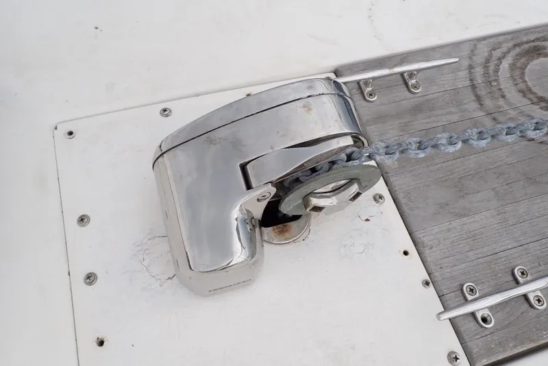 Slide: The Image of Anchor windlass on 1987 Sea Ray 300 Weekender boat deck. - 9