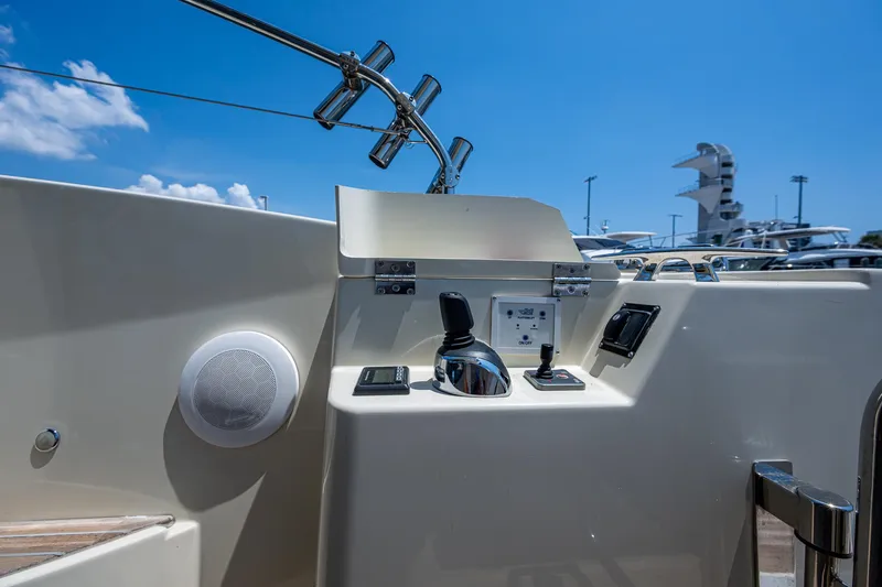 Slide: The Image of 2015 Beneteau MONTE CARLO yacht control panel under clear blue sky. - 20
