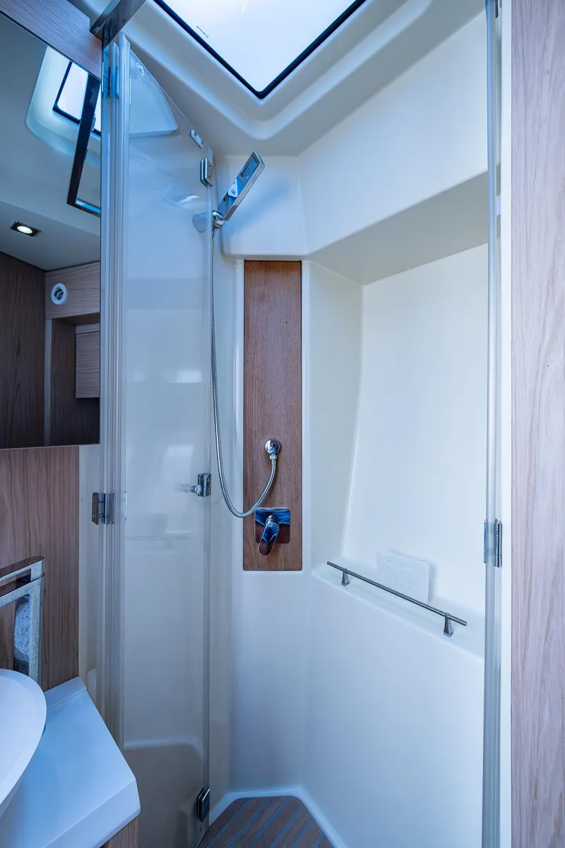 Slide: The Image of 2015 Beneteau MONTE CARLO yacht shower with modern fixtures and skylight. - 36