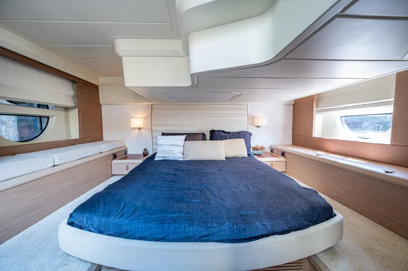 Slide: The Image of Luxurious bedroom interior of 2015 Beneteau Monte Carlo yacht with modern design and cozy bedding. - 41
