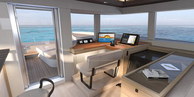 Slide: The Image of Luxurious Lagoon 83 yacht interior, featuring modern navigation equipment and ocean views, 2025 model. - 13