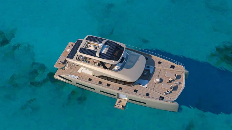 Slide: The Image of Luxury Lagoon 83 yacht, 2025 model, cruising on clear turquoise waters. - 25