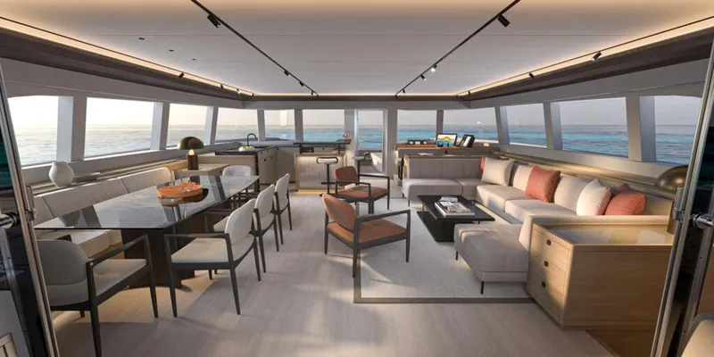 Slide: The Image of Luxurious interior of 2025 Lagoon 83 yacht with modern furnishings and panoramic ocean views. - 9