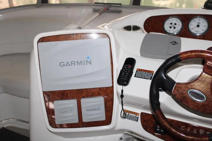 Slide: The Image of Dashboard of 2004 Meridian 381 Sedan with Garmin navigation system and wood accents. - 23