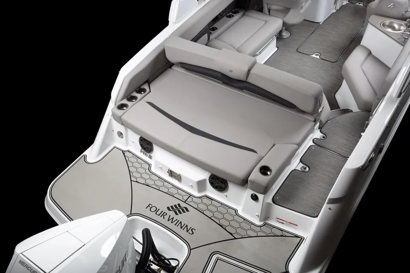 Slide: The Image of 2026 Four Winns HD8 boat interior with spacious seating and modern design. - 31