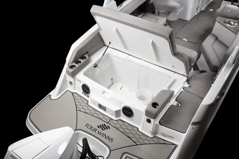 Slide: The Image of 2026 Four Winns HD8 boat interior with open storage compartment and seating. - 39