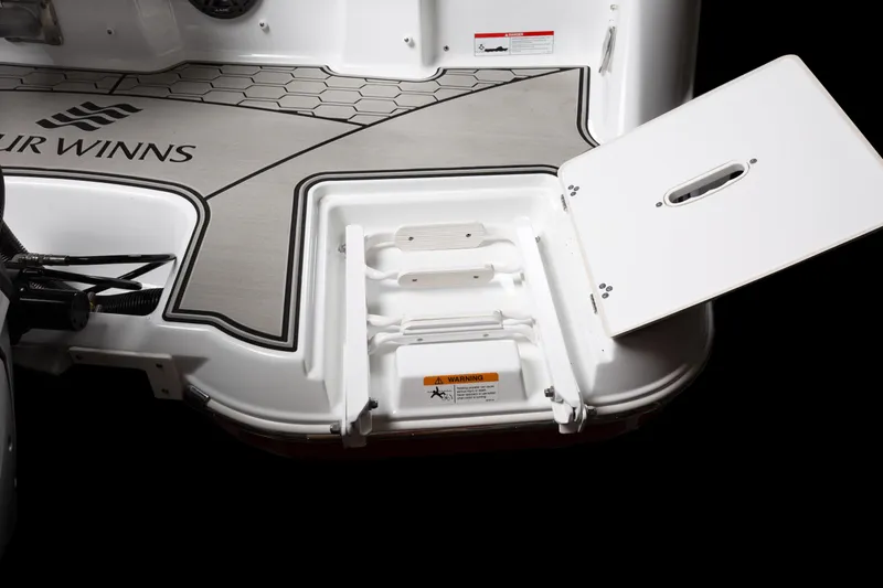 Slide: The Image of 2026 Four Winns HD8 boat swim platform with storage compartment and ladder. - 42