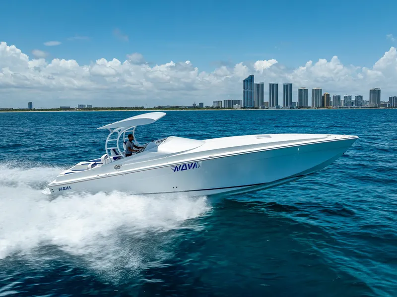The Image of 2020 Nova 39 Sport boat cruising on ocean with city skyline in background. - 0