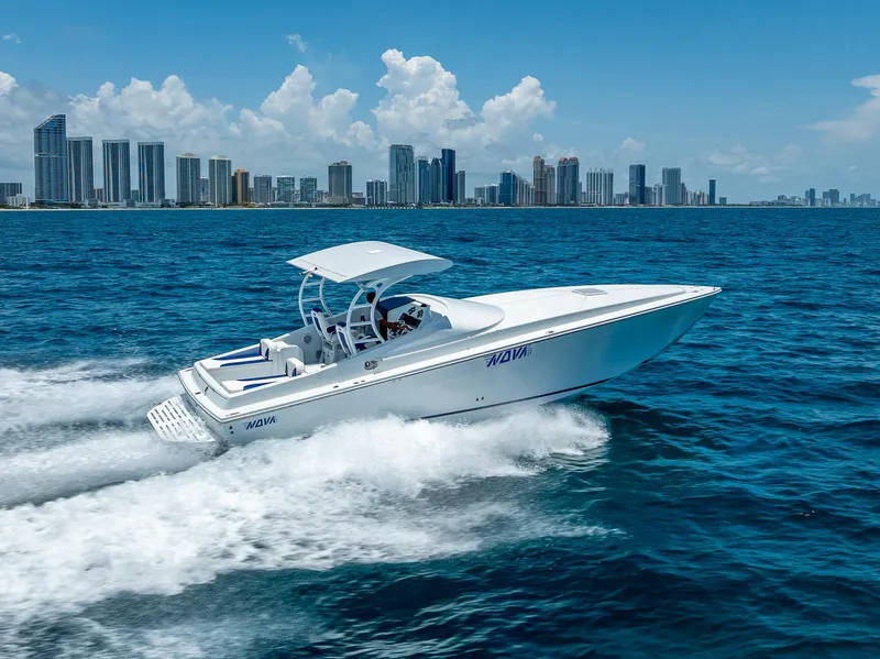 Slide: The Image of Nova 39 Sport 2020 speedboat cruising on ocean with city skyline in background. - 12