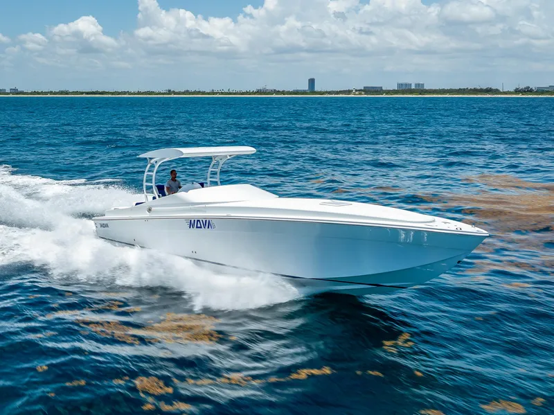 Slide: The Image of Nova 39 Sport 2020 speedboat cruising on blue ocean under clear sky. - 13