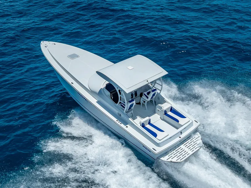 Slide: The Image of 2020 Nova 39 Sport boat cruising on blue ocean waters. - 17