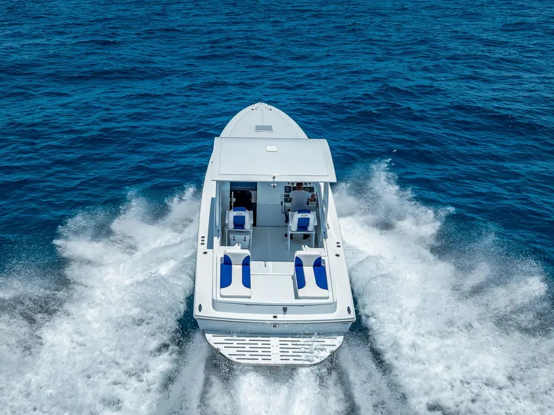 Slide: The Image of Nova 39 Sport 2020 boat cruising on open blue sea, aerial view. - 18