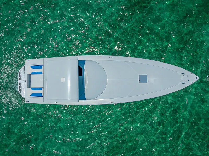 Slide: The Image of Aerial view of 2020 Nova 39 Sport boat on clear turquoise water. - 21