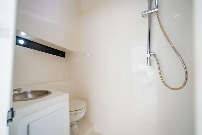 Slide: The Image of Compact bathroom in 2020 Nova 39 Sport boat with shower and sink. - 22