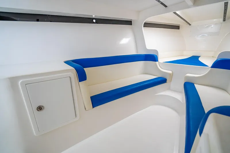 Slide: The Image of Interior of 2020 Nova 39 Sport boat with blue and white seating. - 25