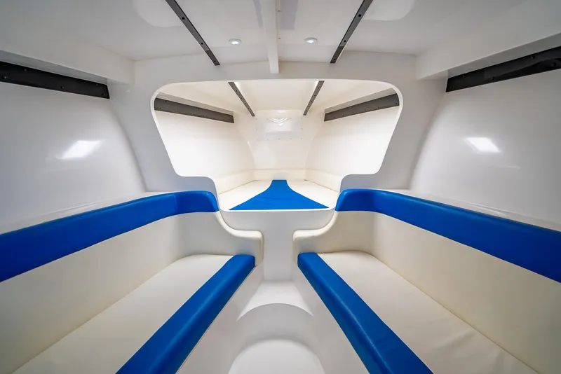 Slide: The Image of Interior of 2020 Nova 39 Sport boat with blue and white seating. - 26