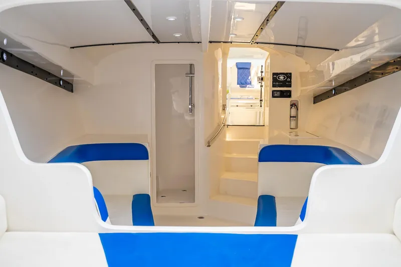 Slide: The Image of Interior of 2020 Nova 39 Sport boat with blue seating and modern design. - 29