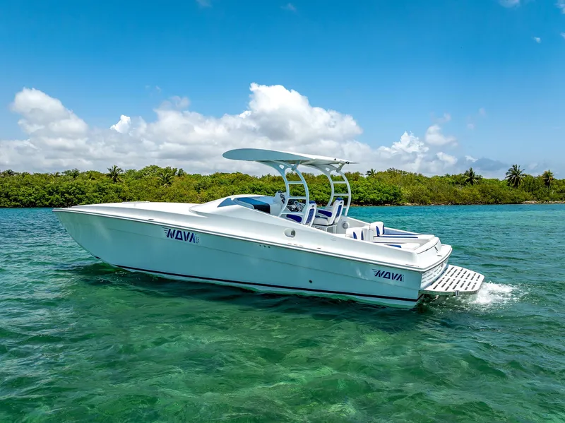 Slide: The Image of Nova 39 Sport 2020 boat cruising on clear turquoise water under a bright blue sky. - 3
