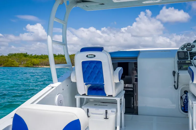Slide: The Image of Nova 39 Sport 2020 boat interior with blue and white seating, ocean view. - 42