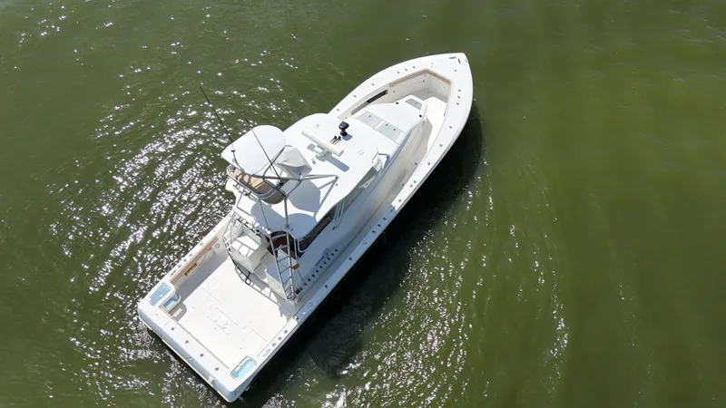 Slide: The Image of 2015 SeaVee 43 Fish-Around boat, aerial view on calm water. - 5