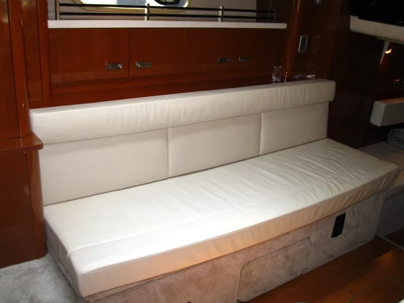 Slide: The Image of Luxurious white leather seating in 2011 Sea Ray 350 Sundancer yacht interior. - 32