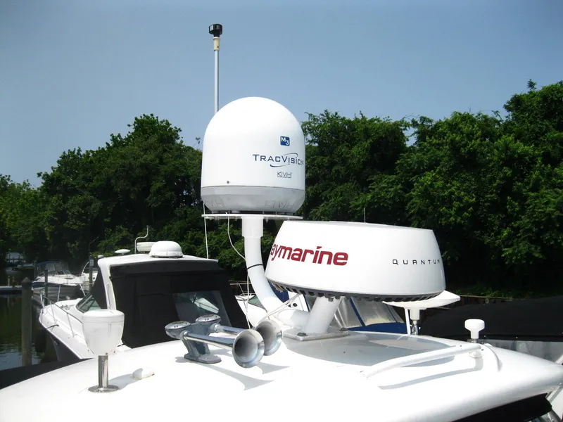 Slide: The Image of 2011 Sea Ray 350 Sundancer with advanced marine electronics and radar equipment. - 7