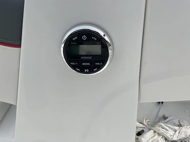 Slide: The Image of 2025 Tahoe T18 audio control panel with digital display and volume buttons. - 12