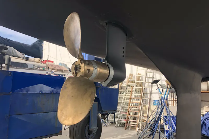 Slide: The Image of Propeller of a 2001 C&C 121 sailboat in a shipyard setting. - 11