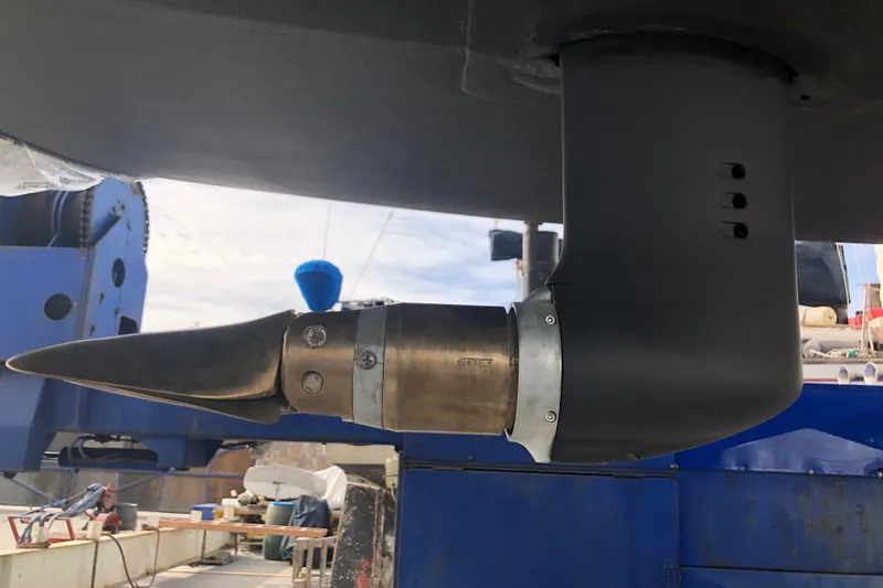 Slide: The Image of Rudder and propeller of a 2001 C&C 121 sailboat in a shipyard. - 12