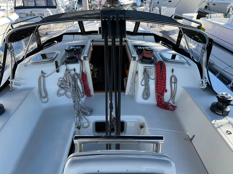 Slide: The Image of Cockpit of 2001 C&C 121 sailboat with ropes and winches visible. - 15