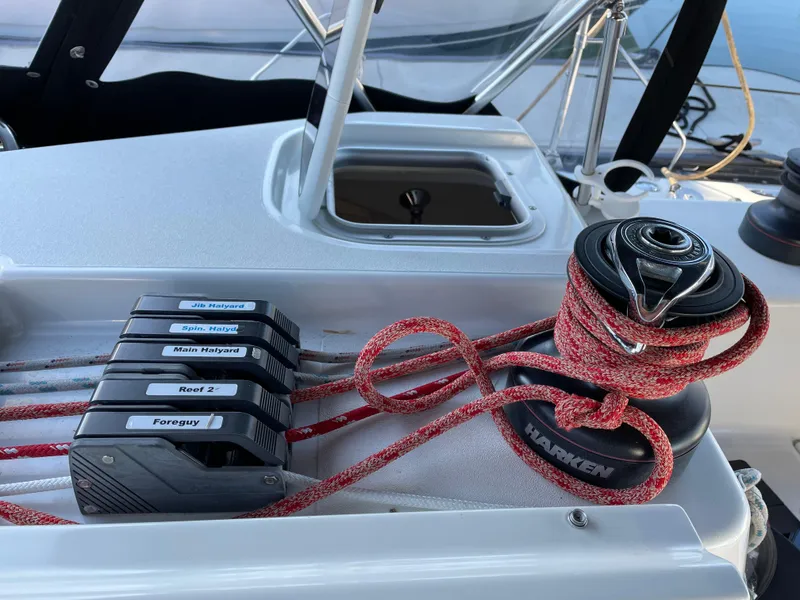 Slide: The Image of Sailboat deck with winch and labeled rope clutches, C&C 121, 2001 model. - 19