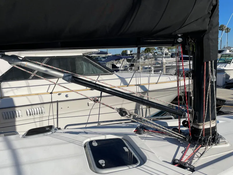 Slide: The Image of Sailboat deck with rigging, C&C 121 model, 2001, docked at marina. - 26