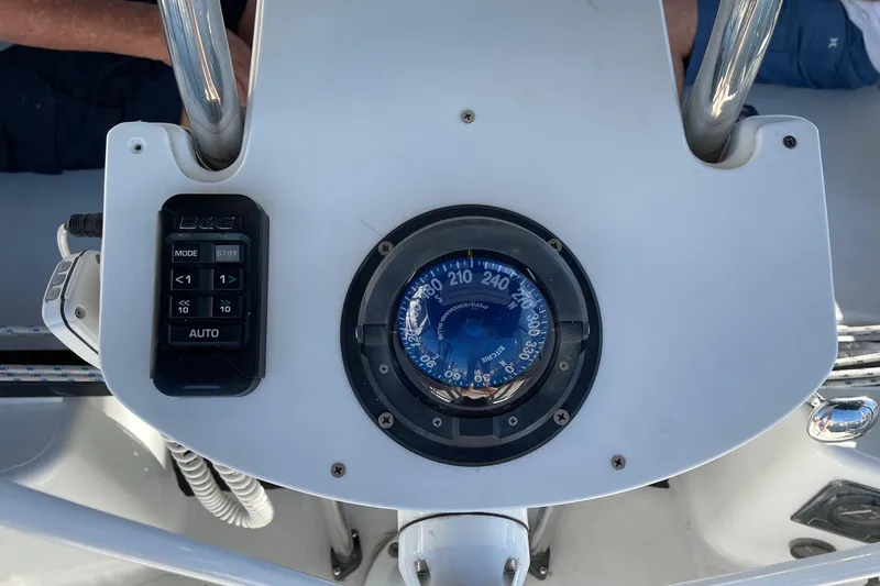 Slide: The Image of Boat steering console with compass and control panel, C&C 121, 2001 model. - 31