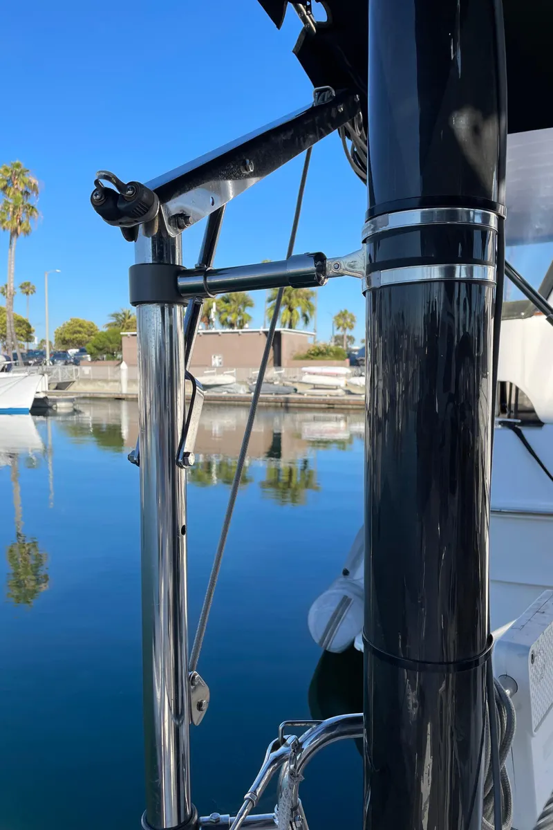Slide: The Image of Close-up of a 2001 C&C 121 sailboat mast and rigging in a marina. - 32