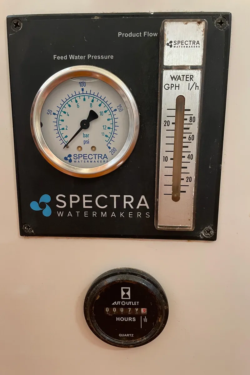 Slide: The Image of Spectra Watermakers control panel with pressure gauge and flow meter, C&C 121, 2001 model. - 33