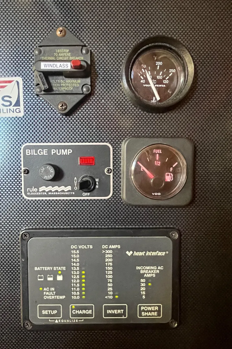 Slide: The Image of Control panel of a 2001 C&C 121 yacht with gauges and switches. - 34