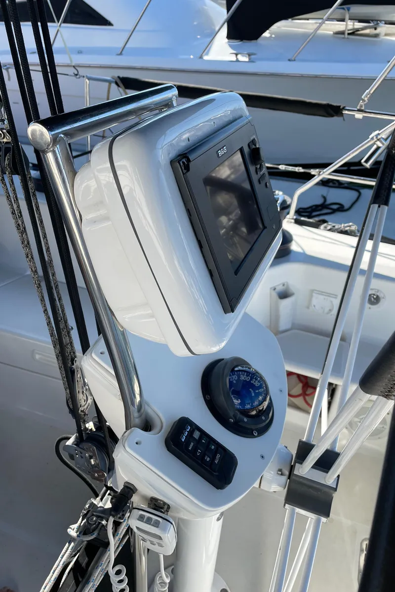Slide: The Image of Sailboat helm with navigation equipment, C&C 121, 2001 model. - 35