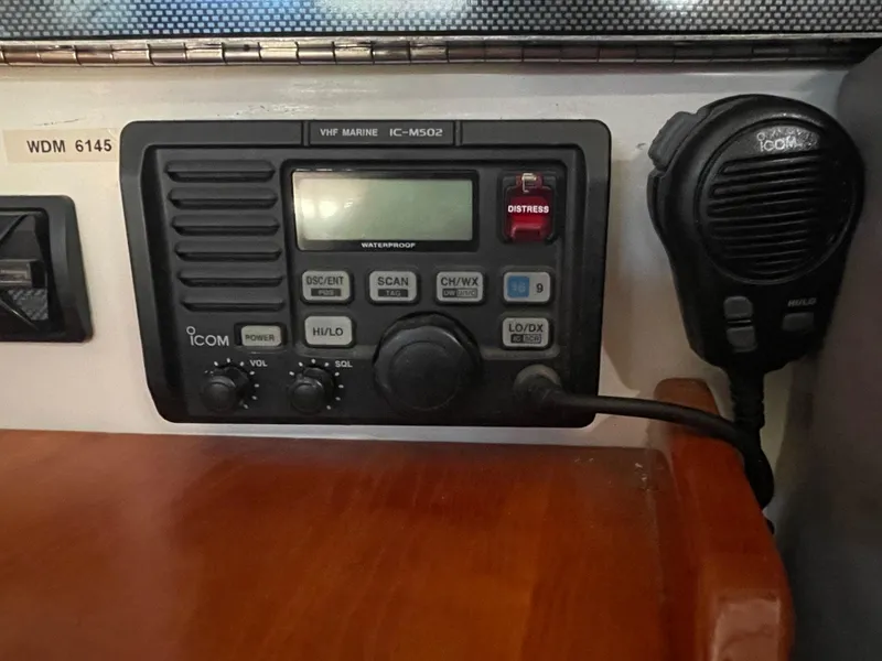 Slide: The Image of VHF marine radio IC-M502 on C&C 121 yacht, 2001 model, with microphone attached. - 37