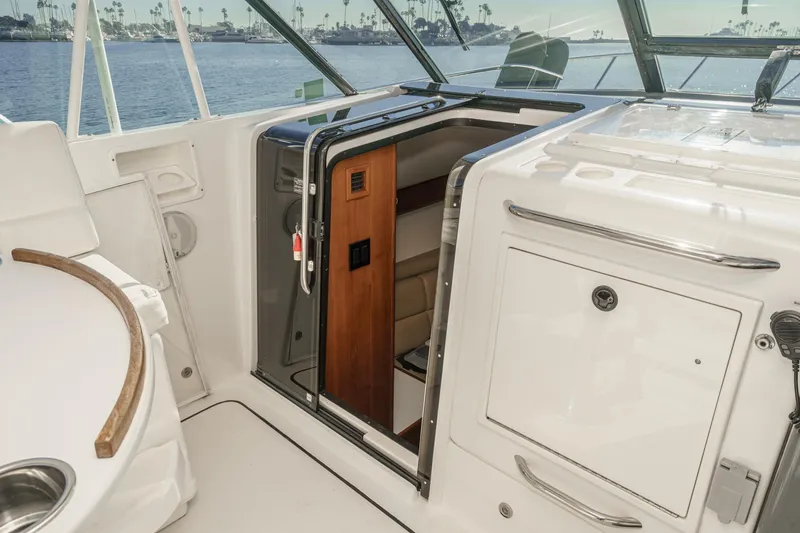 Slide: The Image of 2002 Tiara Yachts 4100 Open interior with cabin entrance and sleek design. - 19