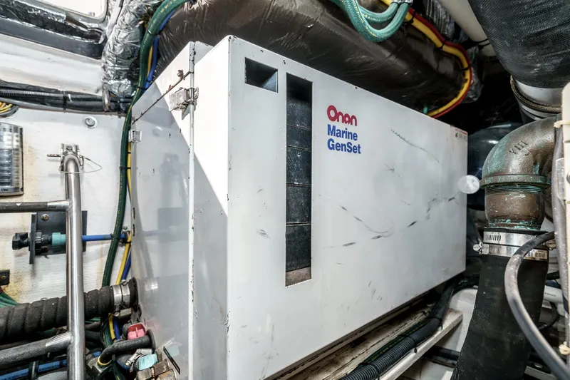 Slide: The Image of Onan Marine GenSet in 2002 Tiara Yachts 4100 Open engine room. - 33