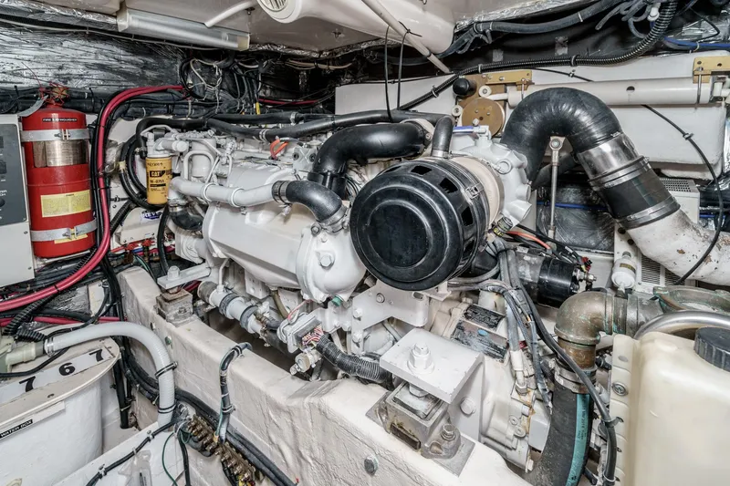 Slide: The Image of Engine room of a 2002 Tiara Yachts 4100 Open, showcasing detailed machinery and components. - 35