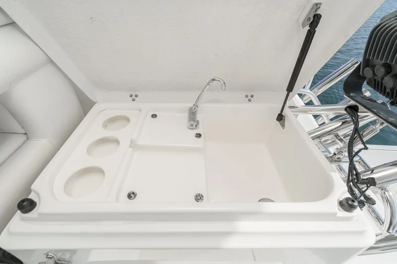Slide: The Image of 2002 Tiara Yachts 4100 Open sink area with faucet and cup holders. - 39