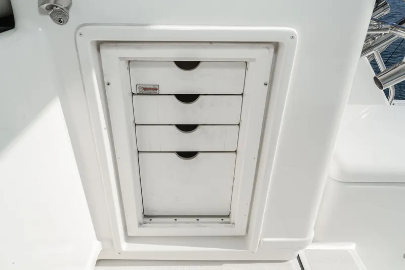 Slide: The Image of Storage drawers on a 2002 Tiara Yachts 4100 Open boat. - 40