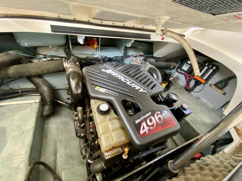 Slide: The Image of Engine compartment of 2001 Sea Ray 290 Bowrider with MerCruiser 496 MAG engine. - 30
