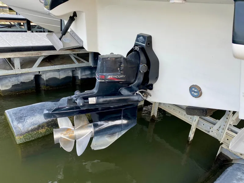 Slide: The Image of Outboard motor of 2001 Sea Ray 290 Bowrider boat at dock. - 33
