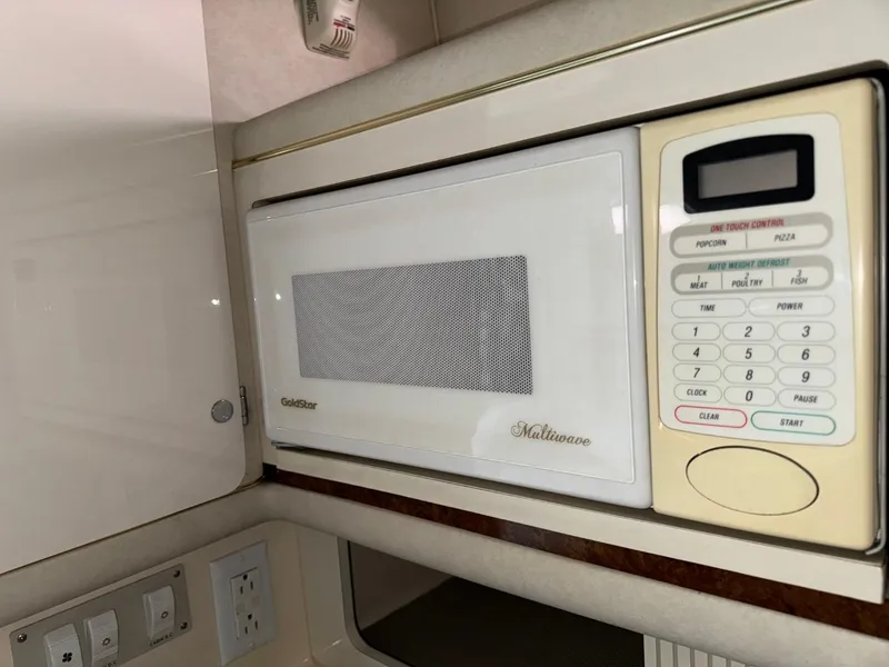 Slide: The Image of Built-in microwave in 1997 Sea Ray 330 Sundancer yacht kitchen. - 22