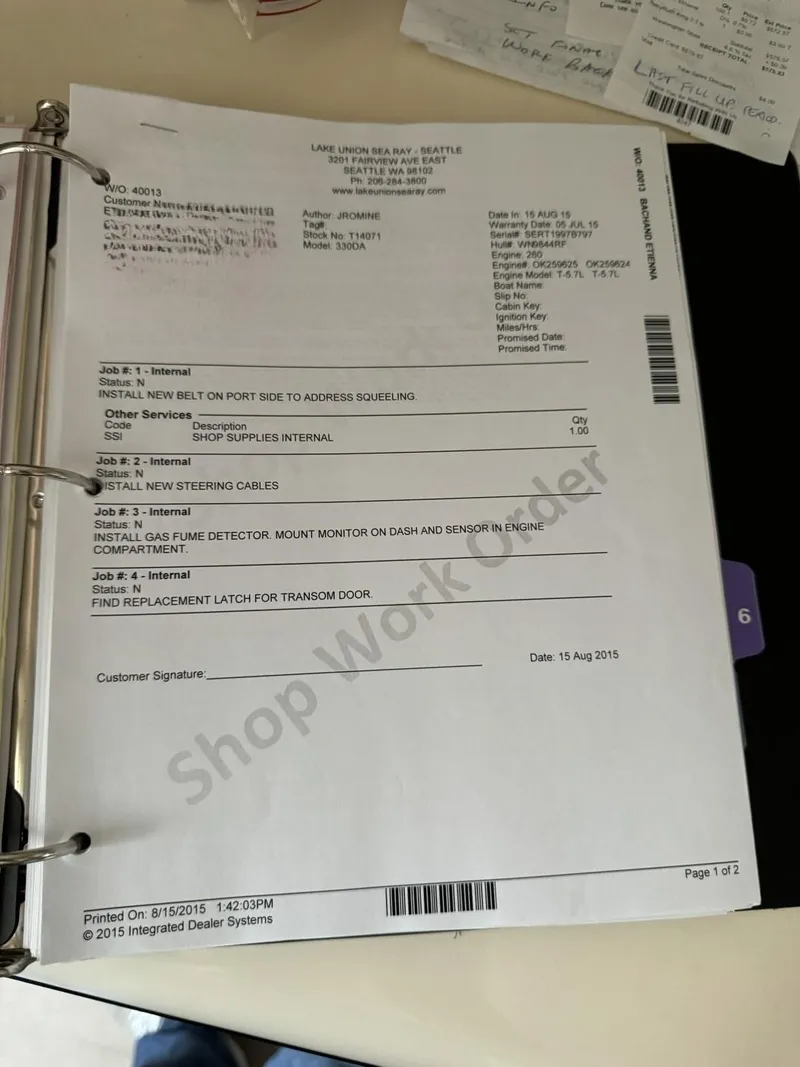 Slide: The Image of Service document for 1997 Sea Ray 330 Sundancer in a binder. - 34