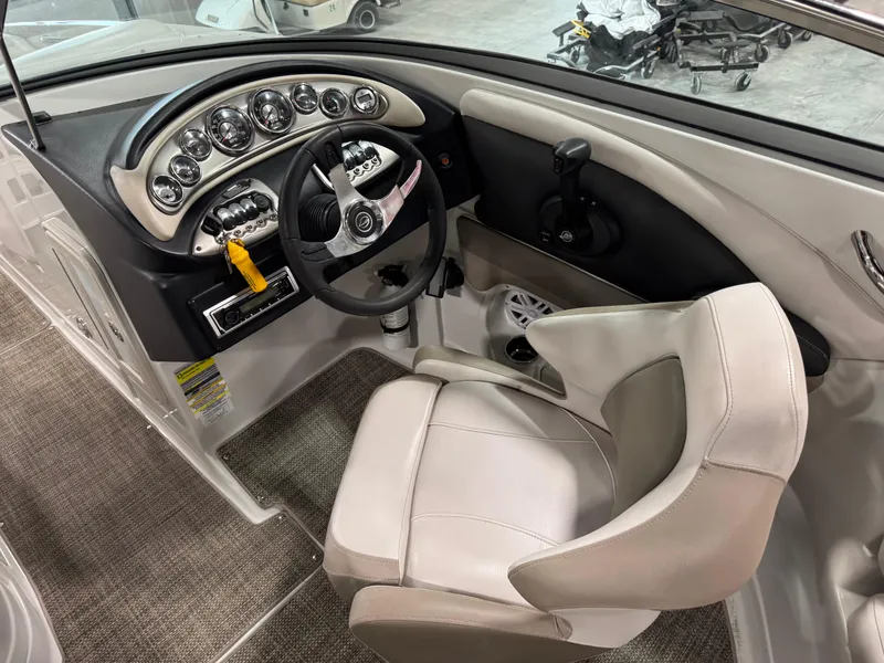 Slide: The Image of 2015 Crownline Eclipse E4 boat cockpit interior view. - 10