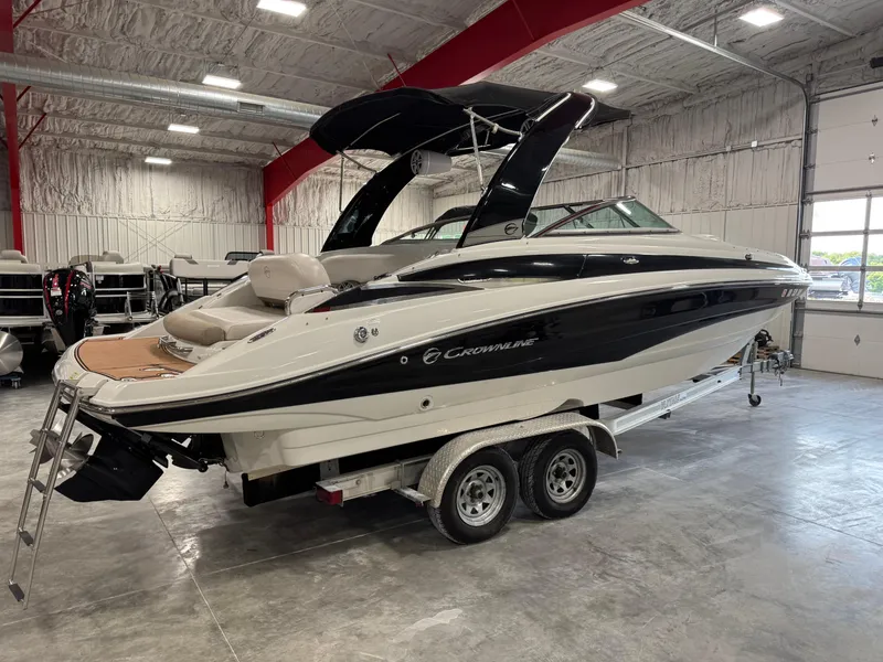 Slide: The Image of 2015 Crownline Eclipse E4 boat in warehouse on trailer. - 4