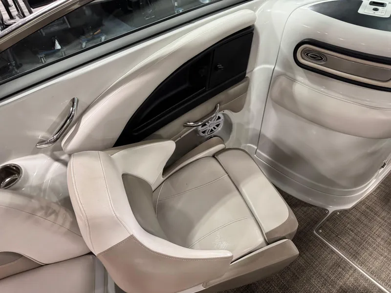 Slide: The Image of Interior of 2015 Crownline Eclipse E4 boat, featuring comfortable seating area. - 9